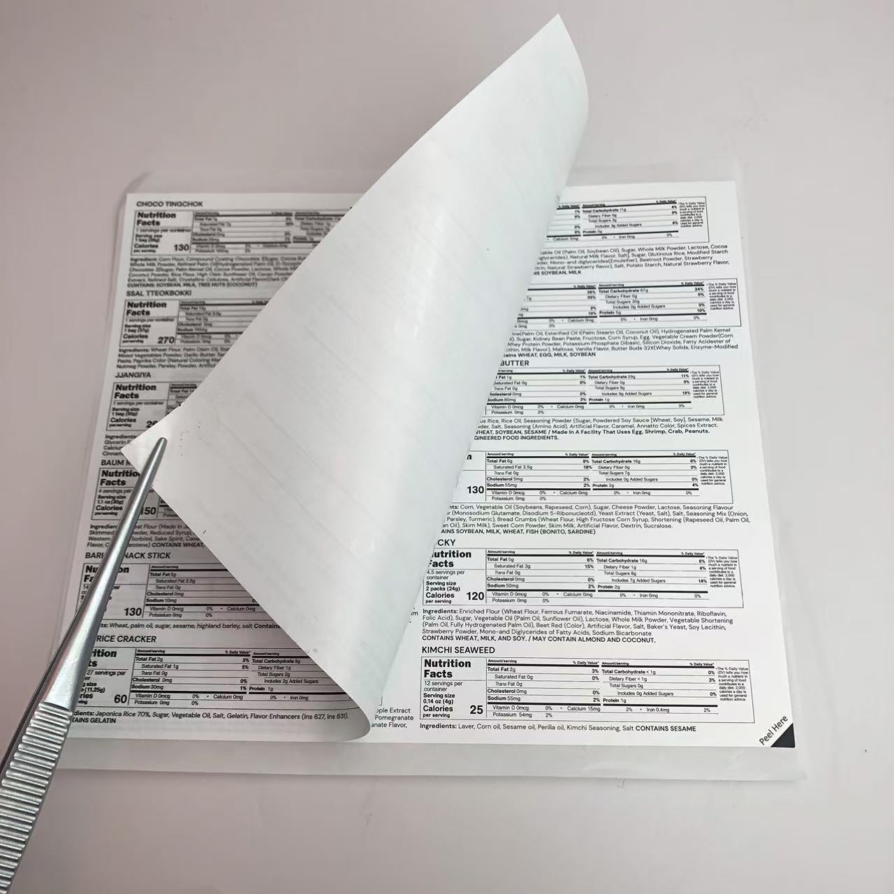 Täydentää 2 kerroksen tarroja