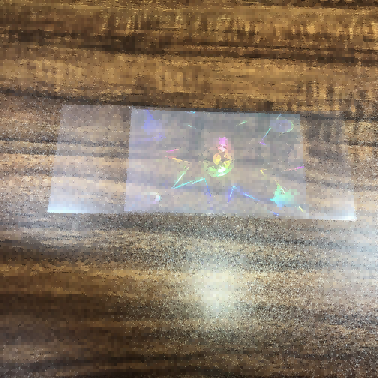 Läpinäkyvät holografiset tarrat